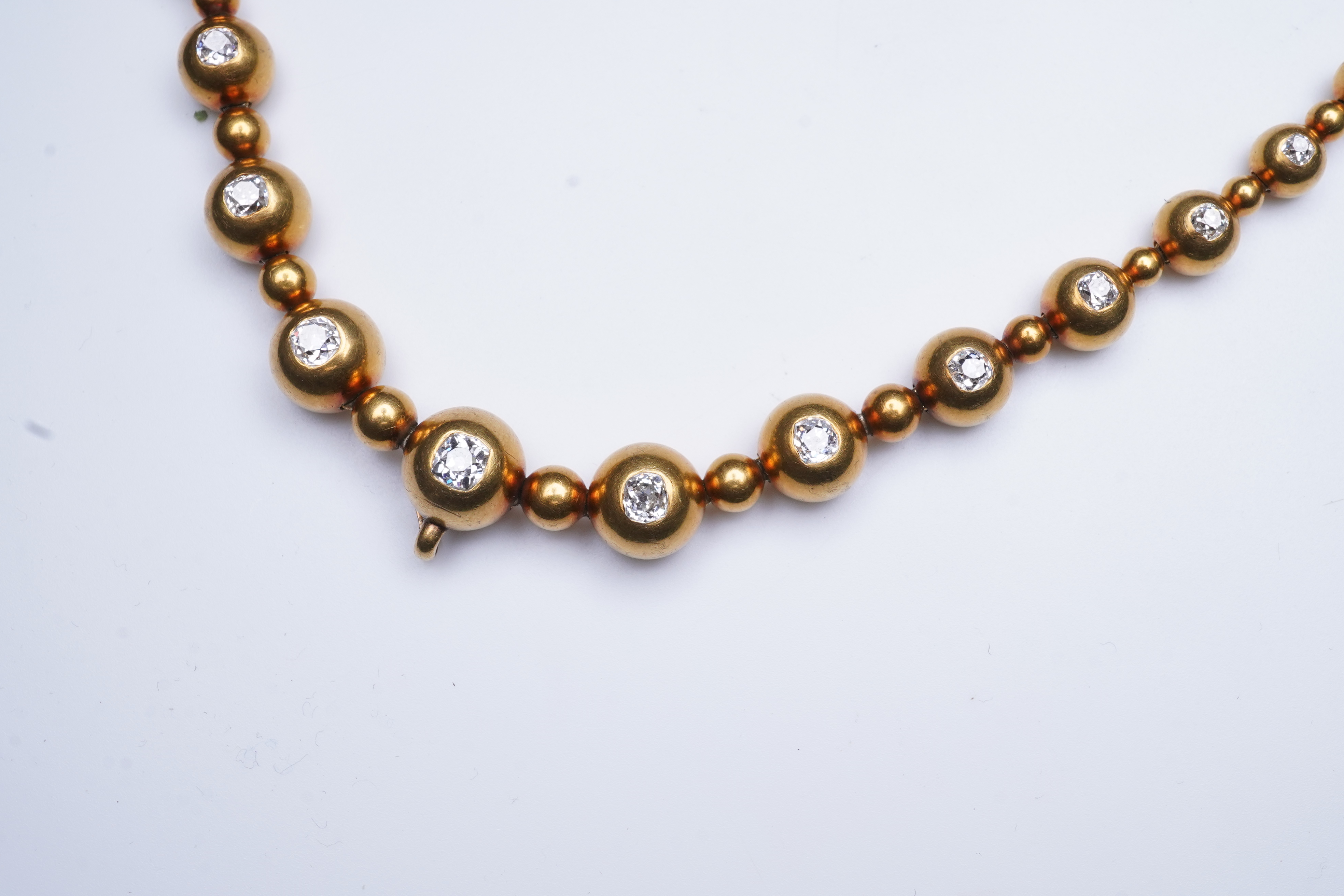 An unusual Victorian gold and diamond necklace, late 19th century